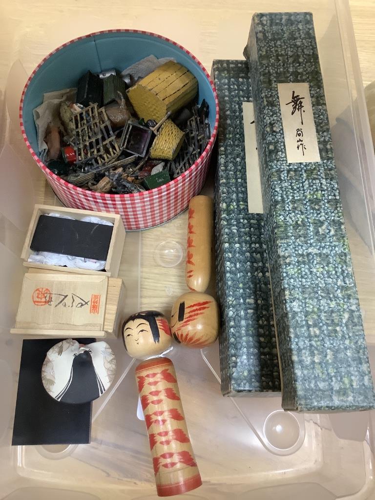 A small collection of Britains lead farm animals and farm accessories, two Japanese hand-painted wooden Kokeshi dolls, two similar tall dolls and sundries